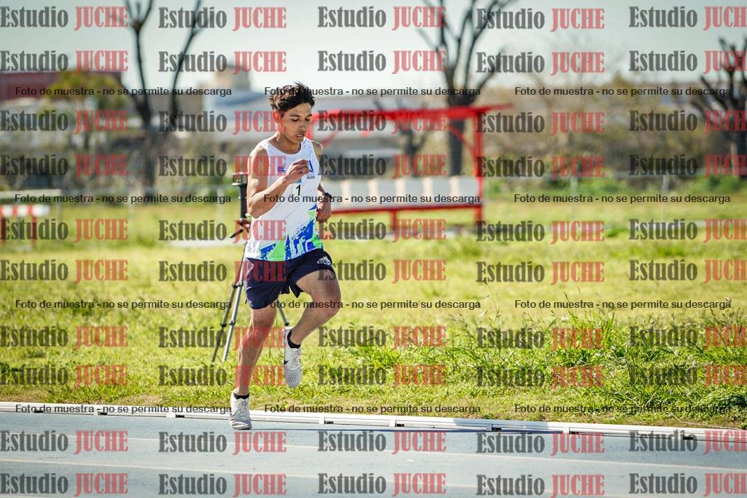 Fotos de los 5000 m llanos de mujeres y varones