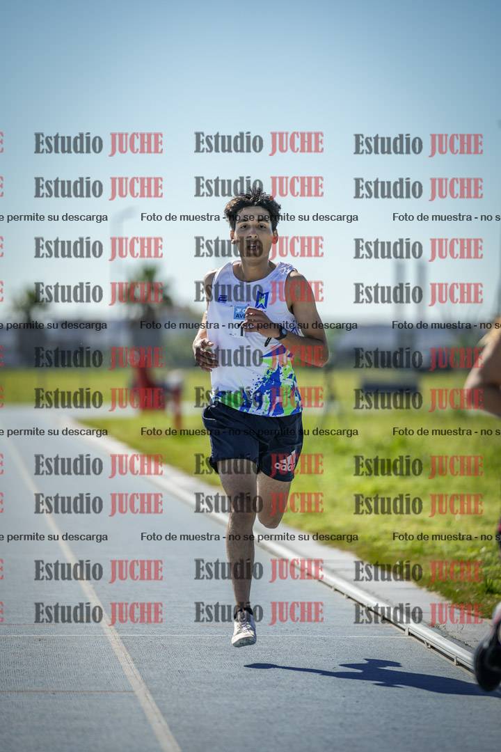 Fotos de los 5000 m llanos de mujeres y varones