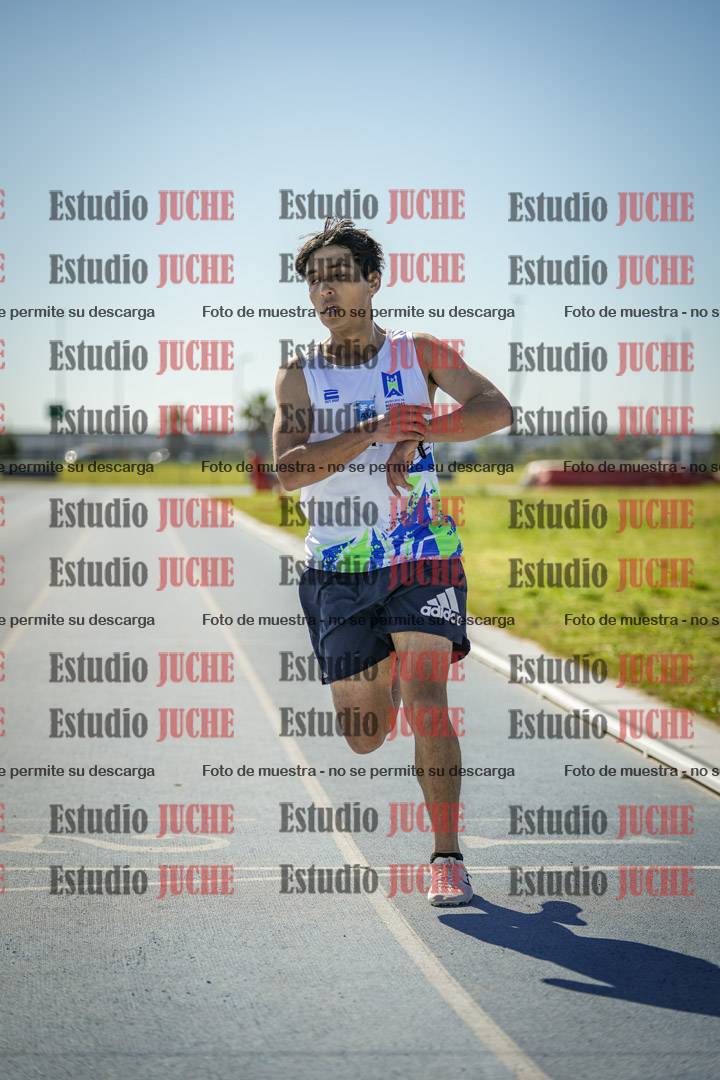 Fotos de los 5000 m llanos de mujeres y varones