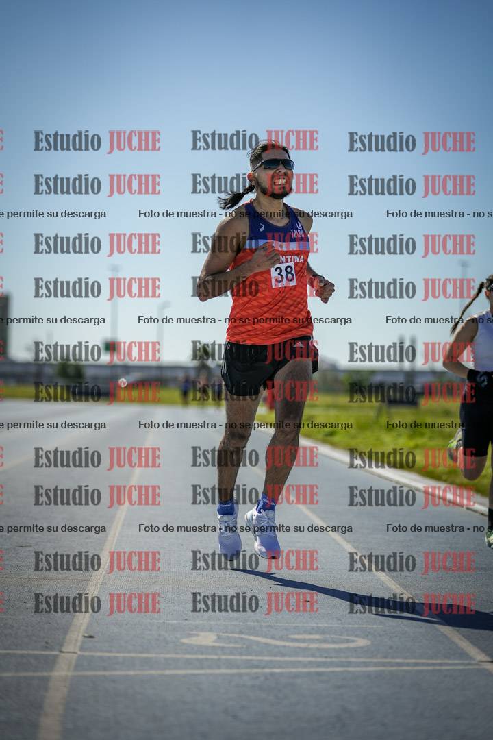 Fotos de los 5000 m llanos de mujeres y varones