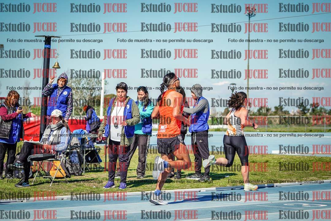 Fotos de los 5000 m llanos de mujeres y varones