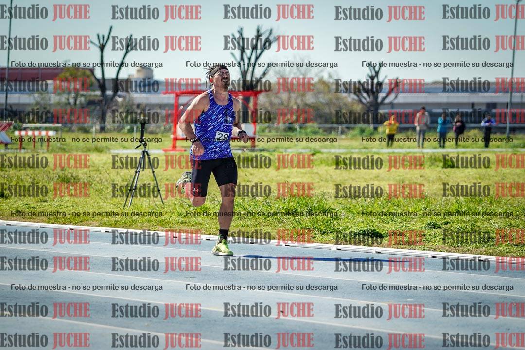 Fotos de los 5000 m llanos de mujeres y varones