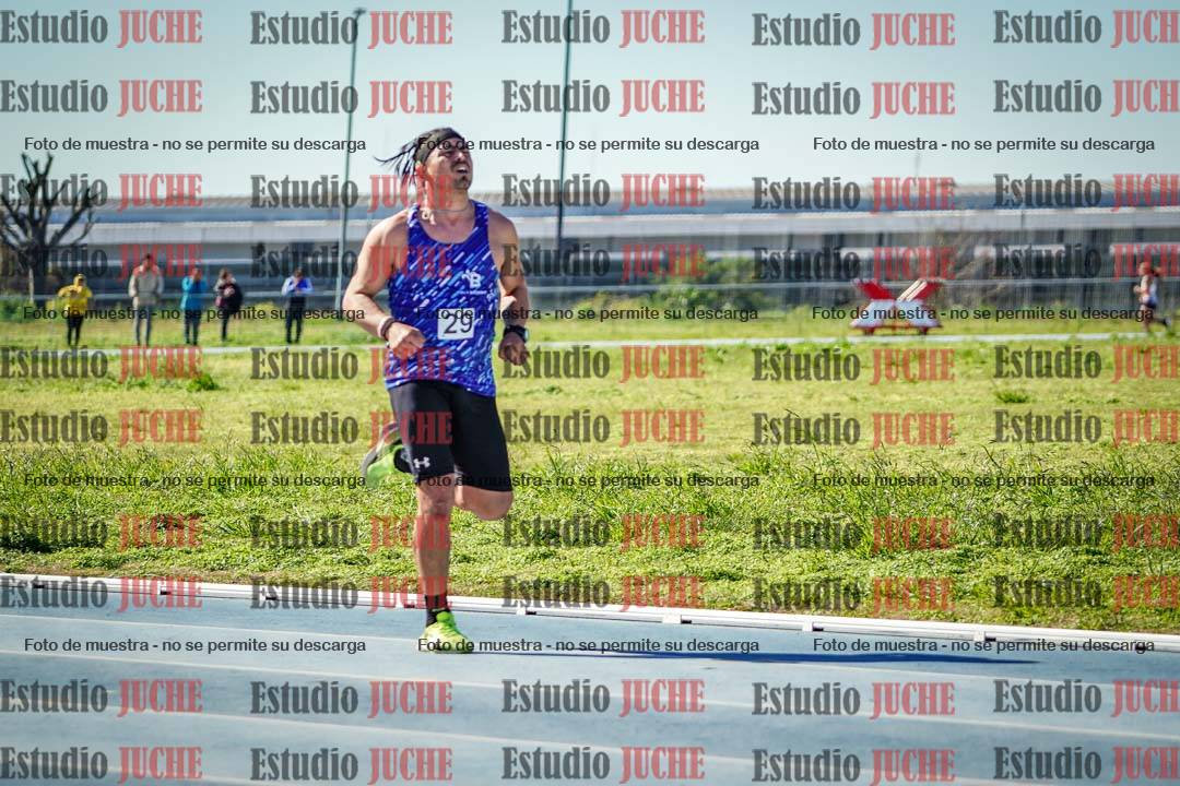 Fotos de los 5000 m llanos de mujeres y varones