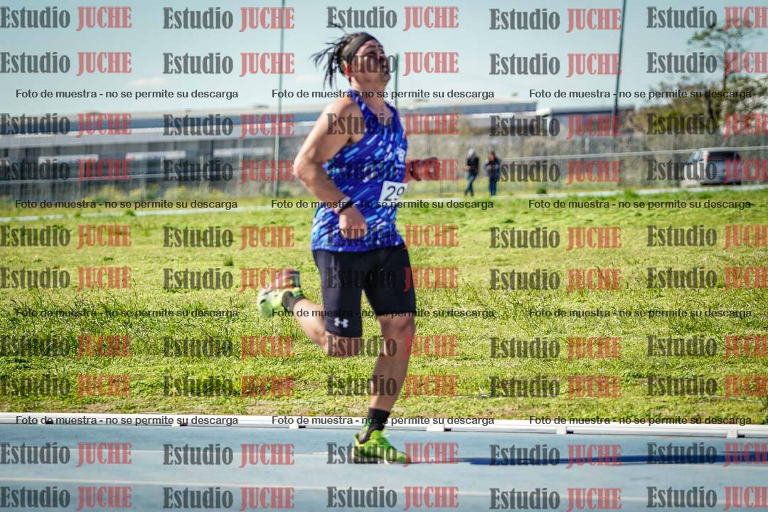 Fotos de los 5000 m llanos de mujeres y varones