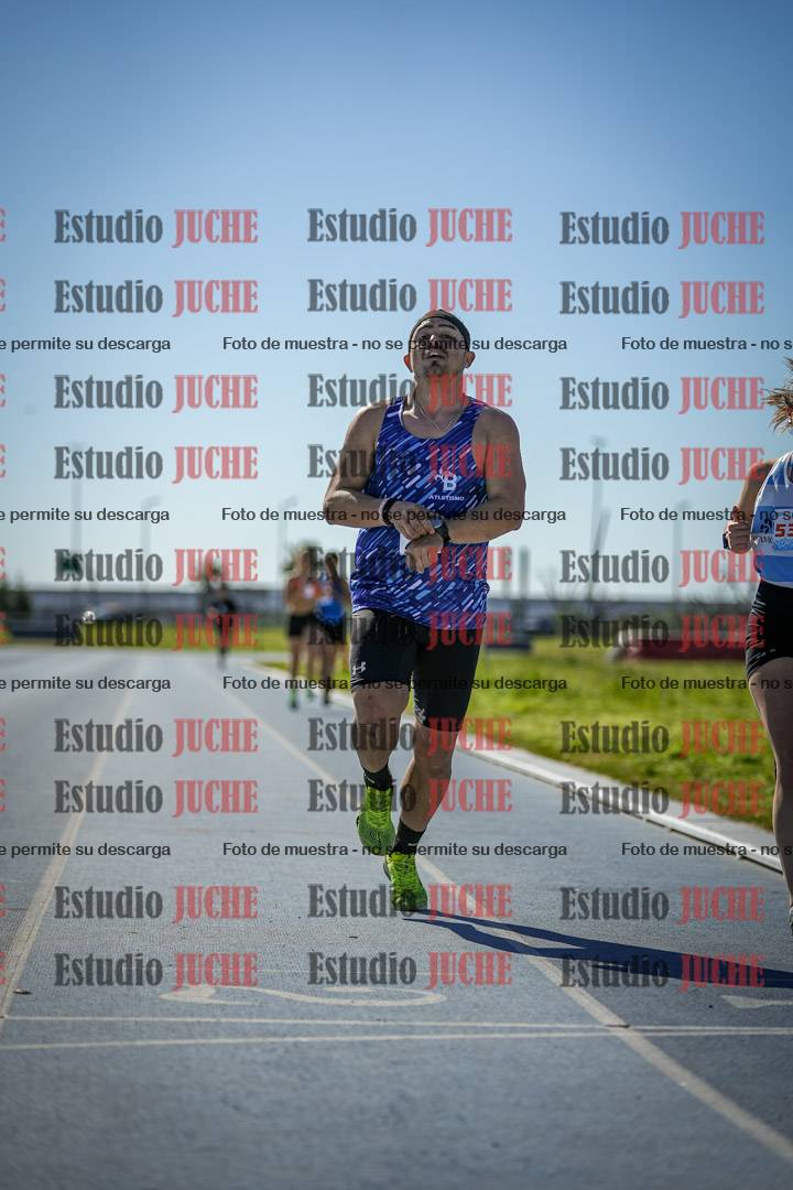 Fotos de los 5000 m llanos de mujeres y varones