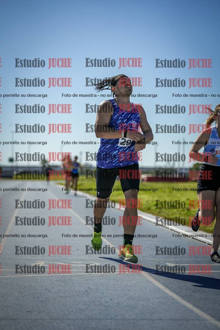 Fotos de los 5000 m llanos de mujeres y varones
