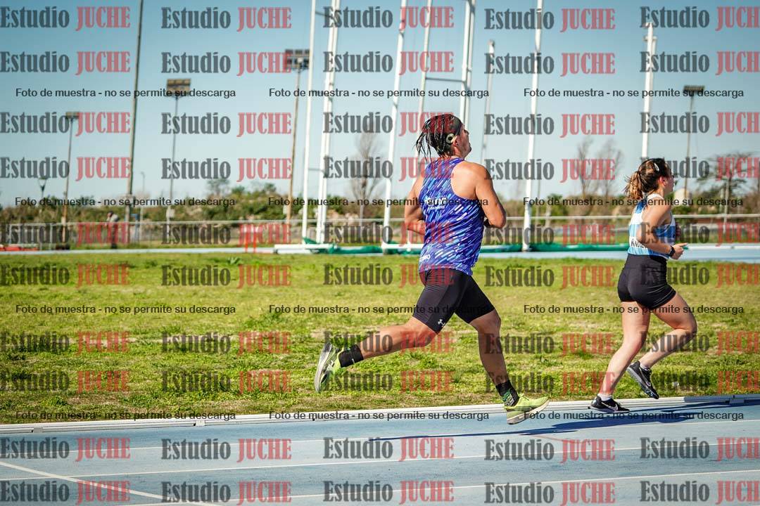 Fotos de los 5000 m llanos de mujeres y varones