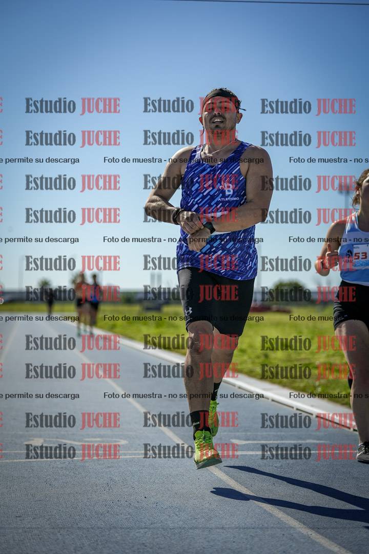 Fotos de los 5000 m llanos de mujeres y varones