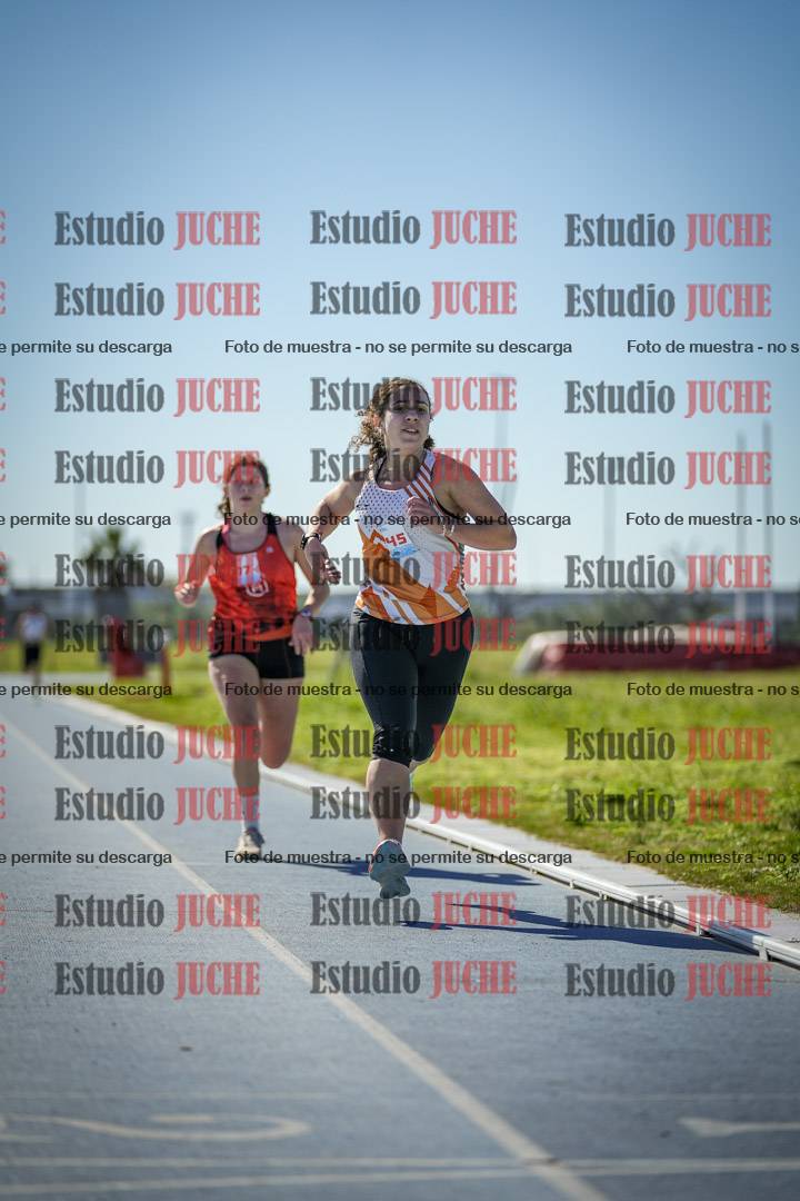 Fotos de los 5000 m llanos de mujeres y varones