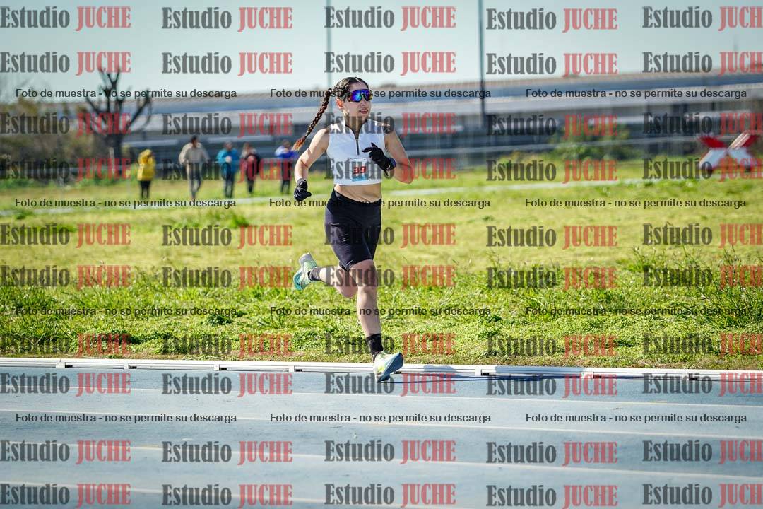 Fotos de los 5000 m llanos de mujeres y varones