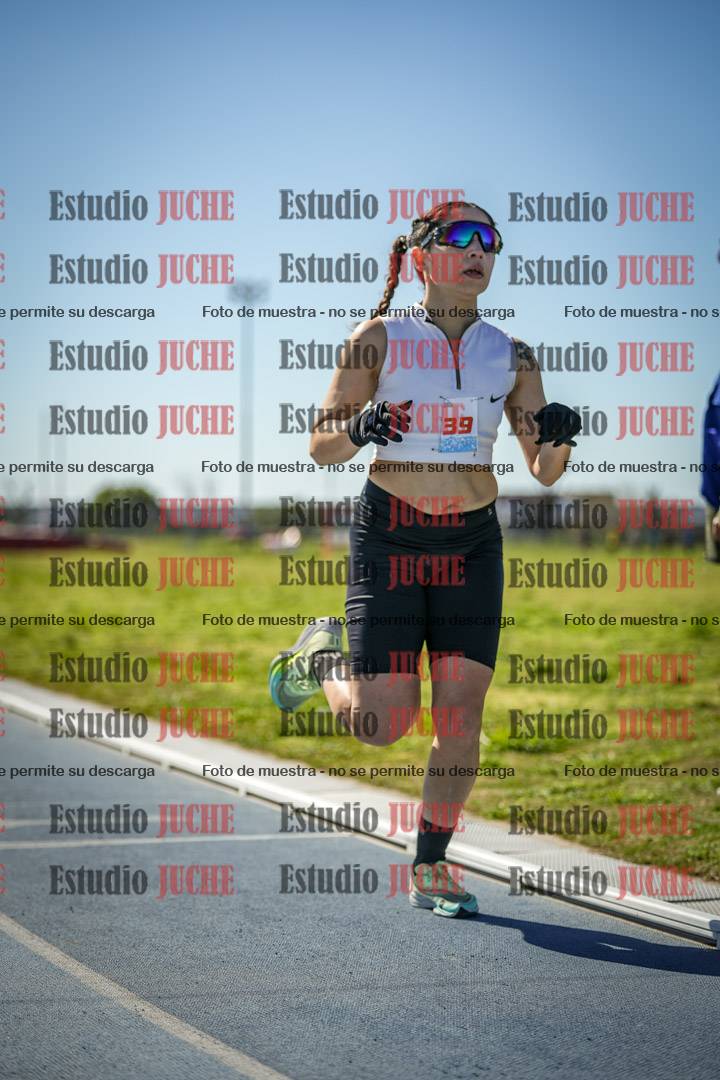 Fotos de los 5000 m llanos de mujeres y varones