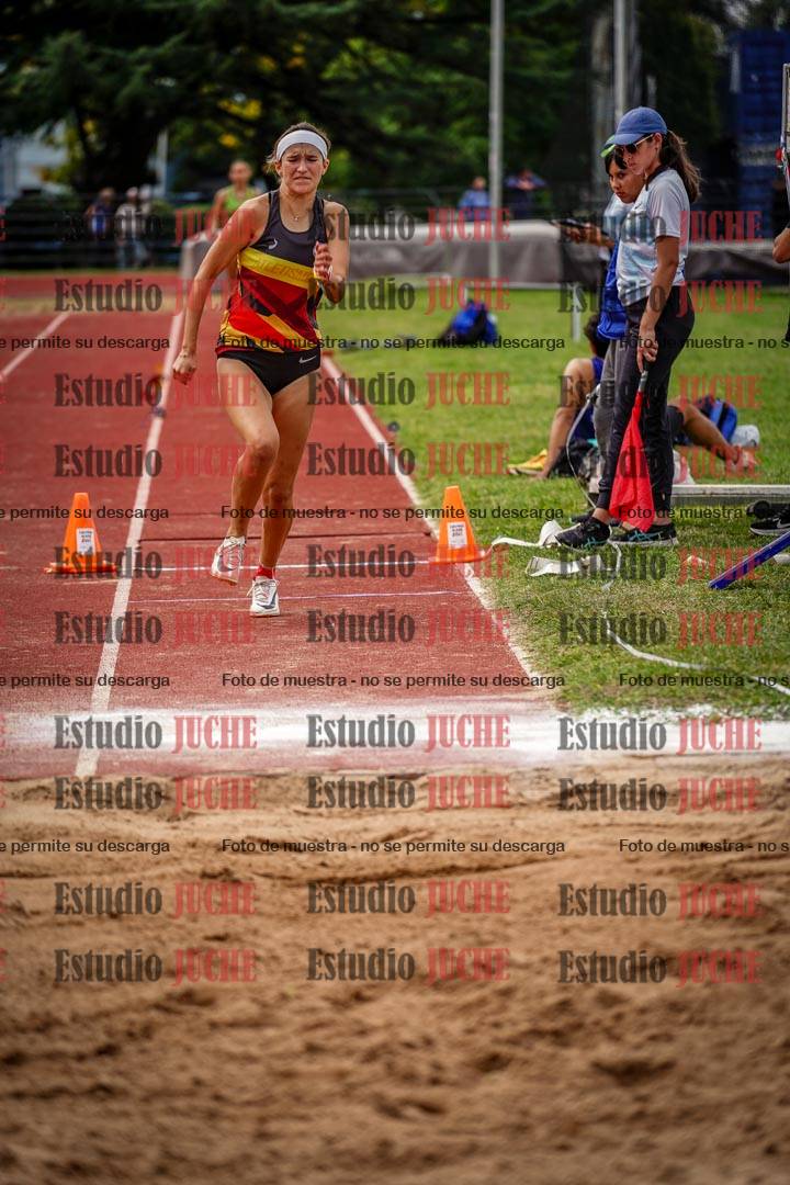Fotos del salto triple de mujeres y varones