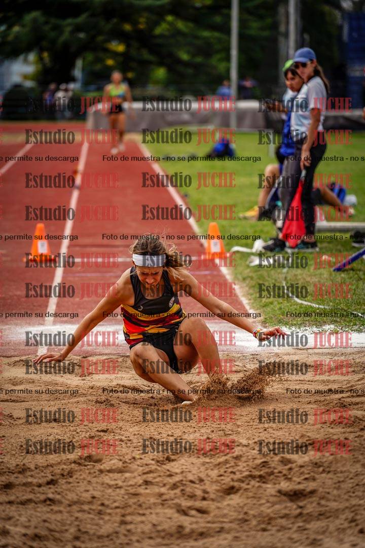 Fotos del salto triple de mujeres y varones