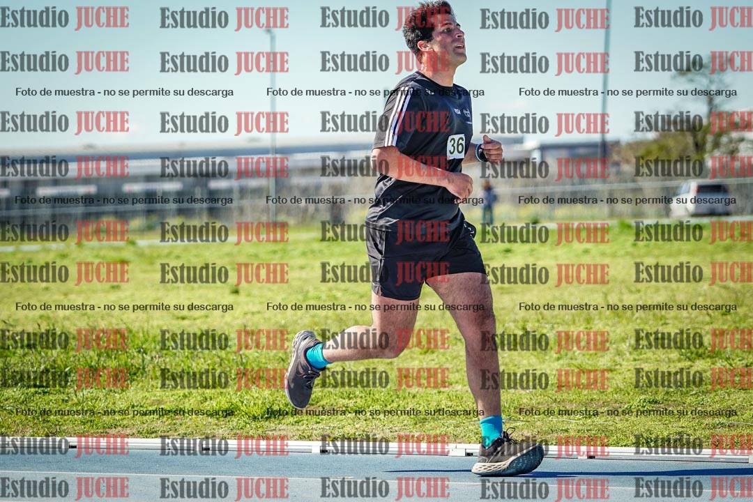 Fotos de los 5000 m llanos de mujeres y varones