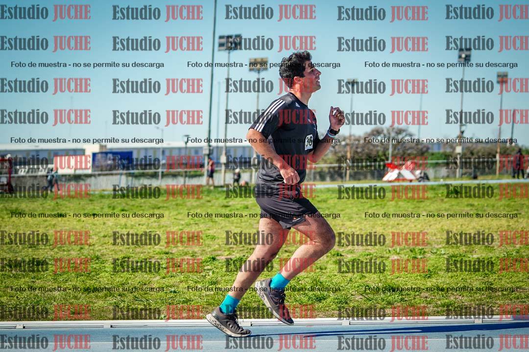 Fotos de los 5000 m llanos de mujeres y varones