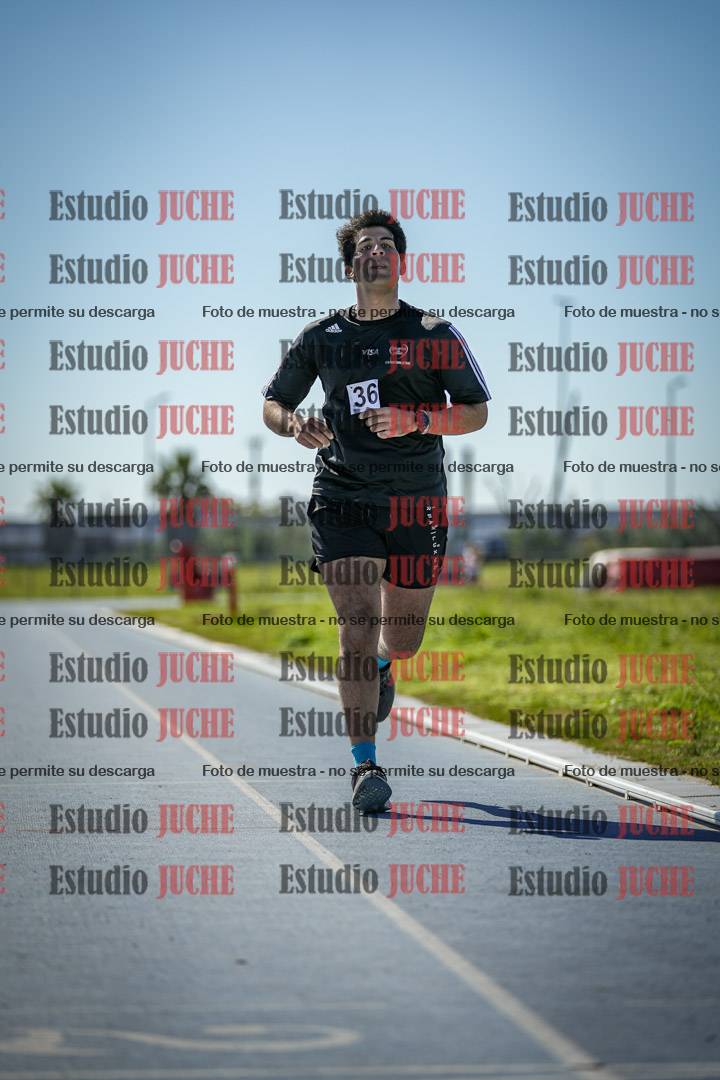 Fotos de los 5000 m llanos de mujeres y varones