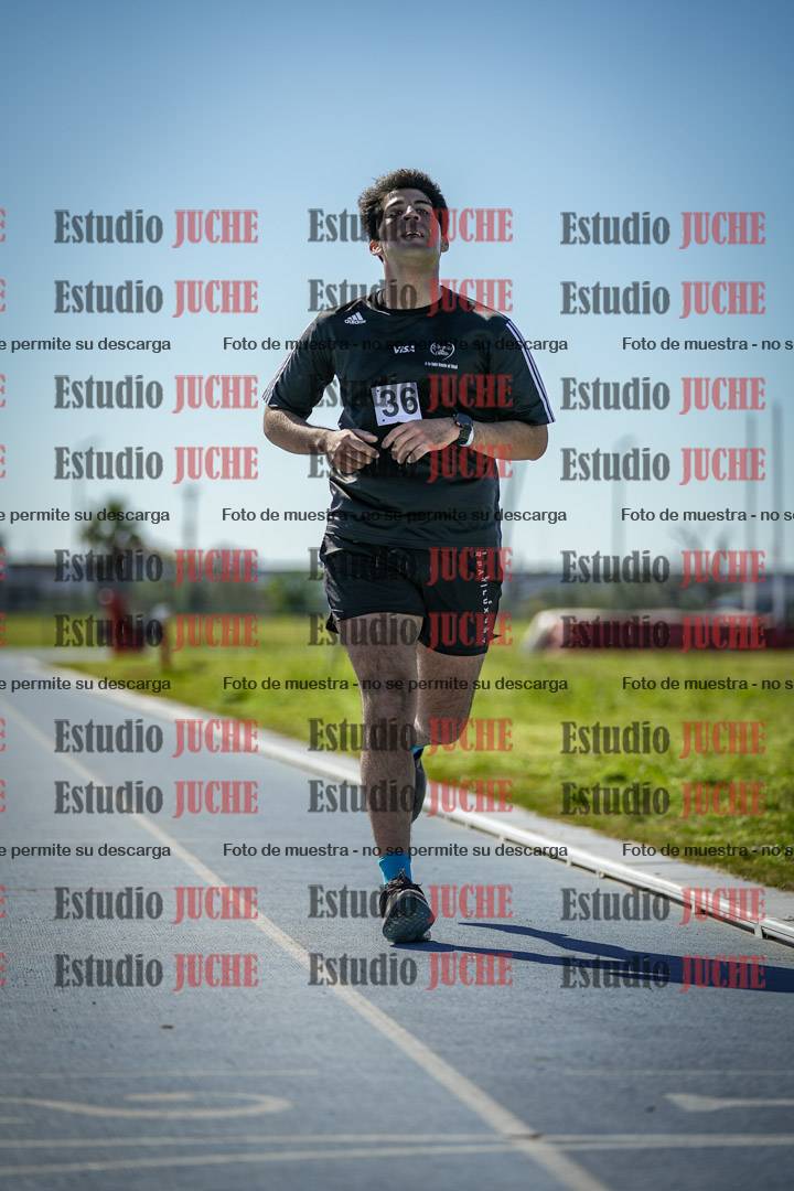 Fotos de los 5000 m llanos de mujeres y varones