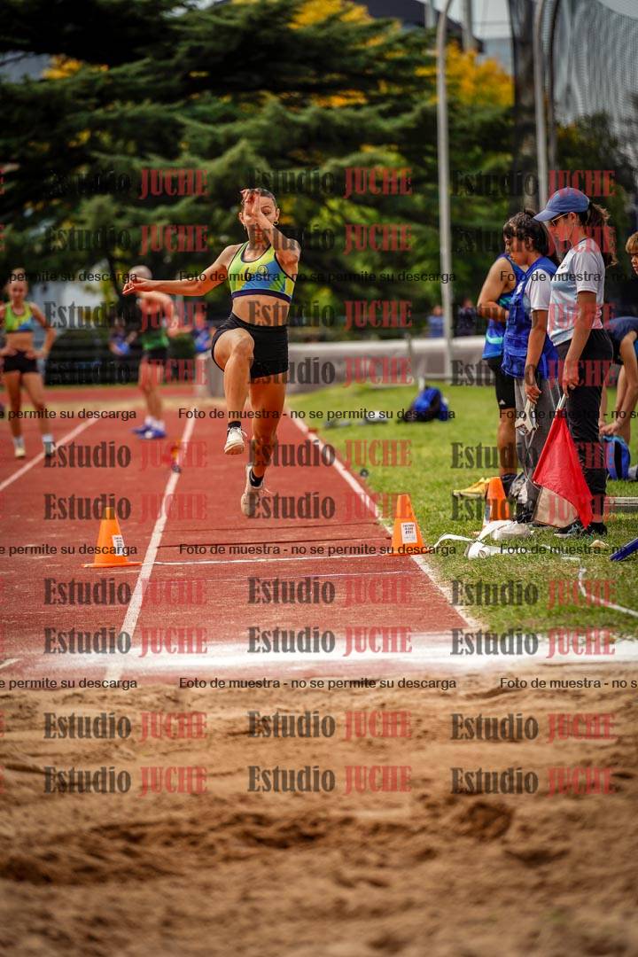 Fotos del salto triple de mujeres y varones