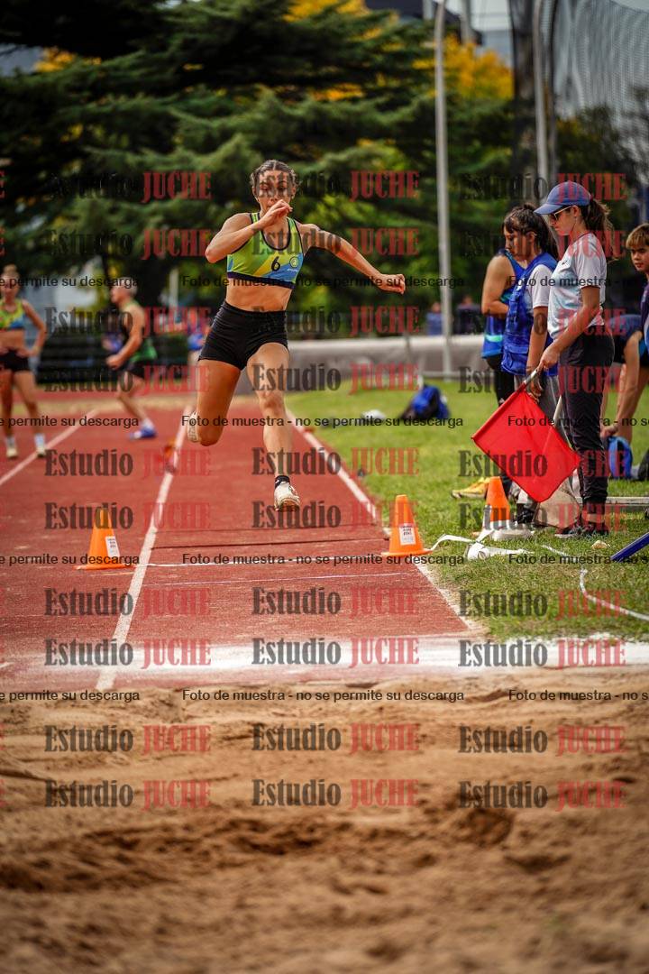 Fotos del salto triple de mujeres y varones