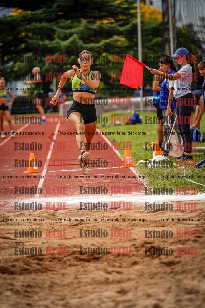 Fotos del salto triple de mujeres y varones