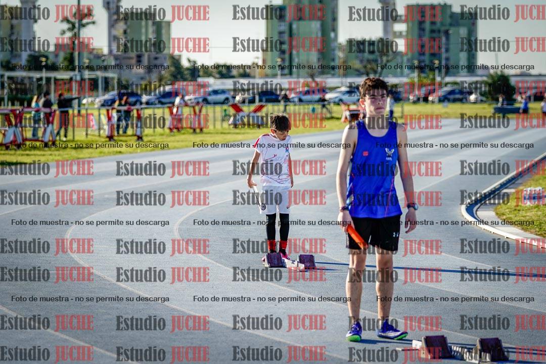 Fotos de las postas 5x80 m de varones