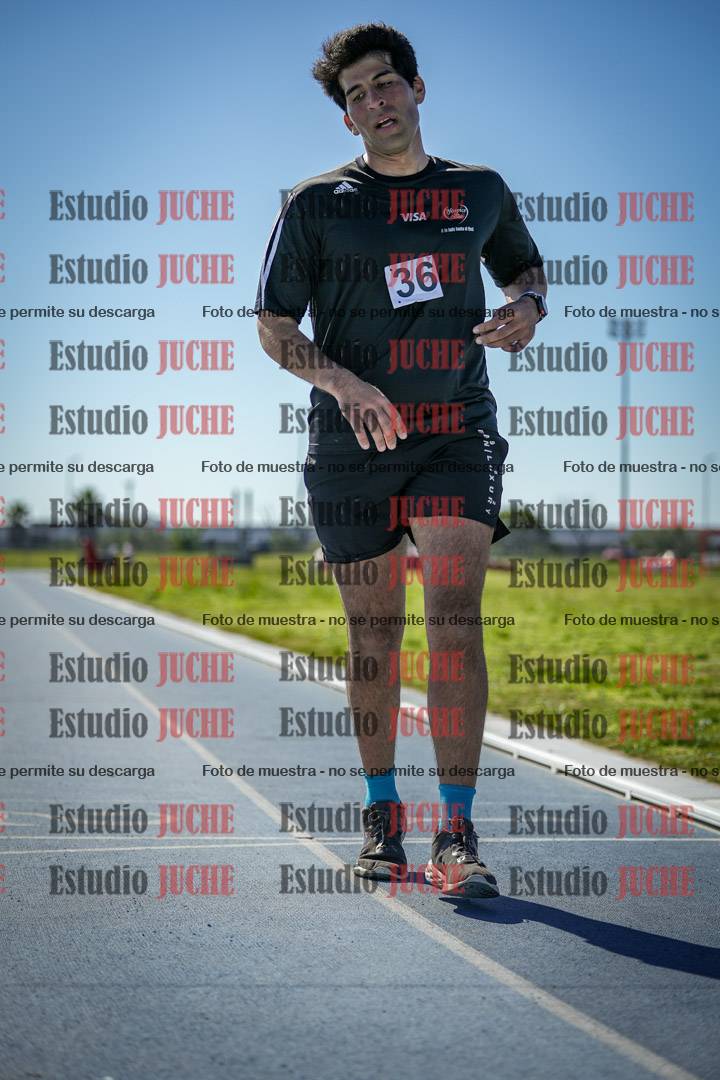 Fotos de los 5000 m llanos de mujeres y varones