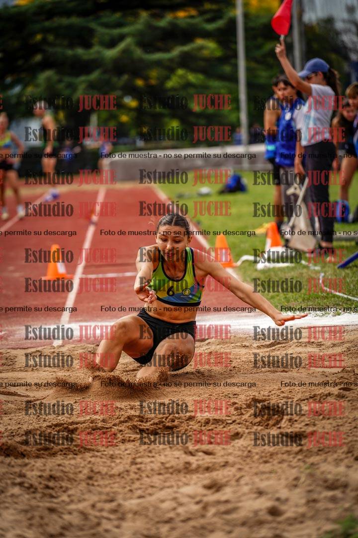 Fotos del salto triple de mujeres y varones