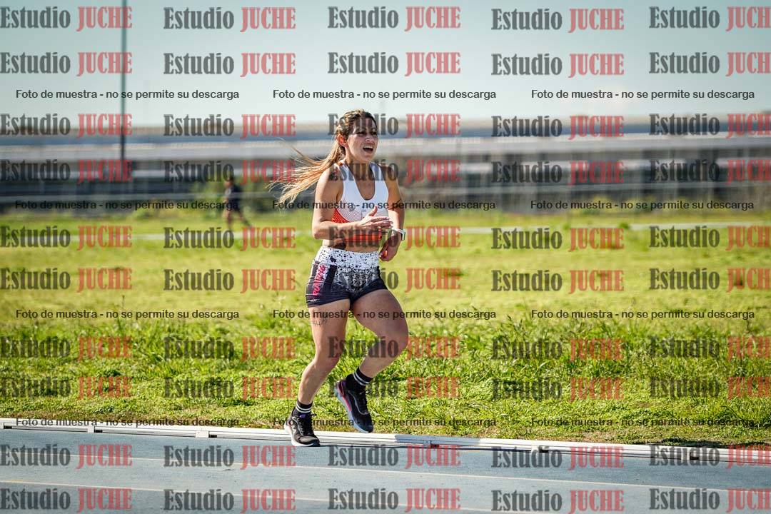 Fotos de los 5000 m llanos de mujeres y varones