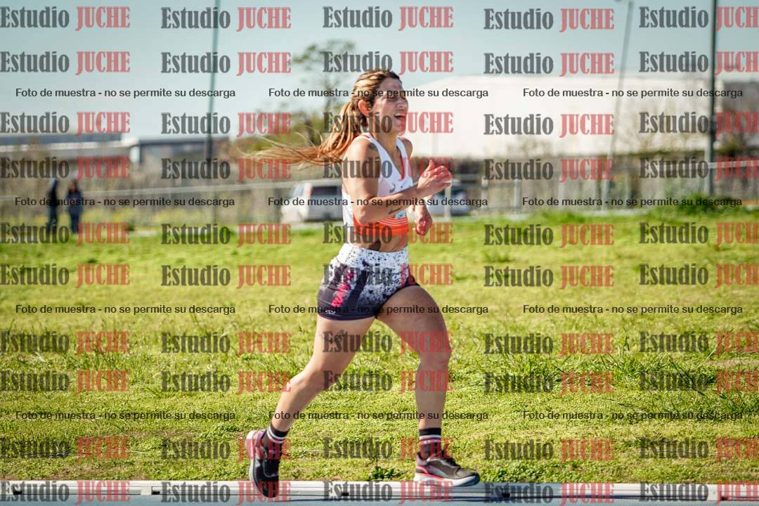 Fotos de los 5000 m llanos de mujeres y varones