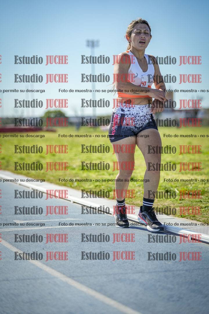 Fotos de los 5000 m llanos de mujeres y varones