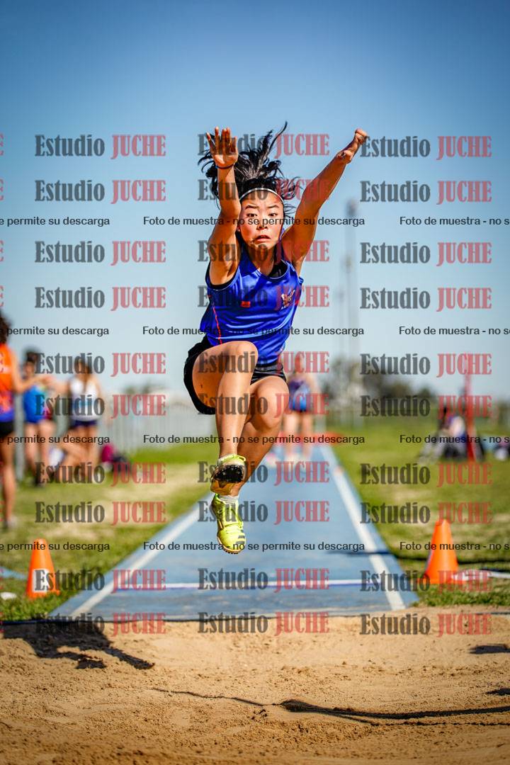 Fotos del salto en largo de mujeres