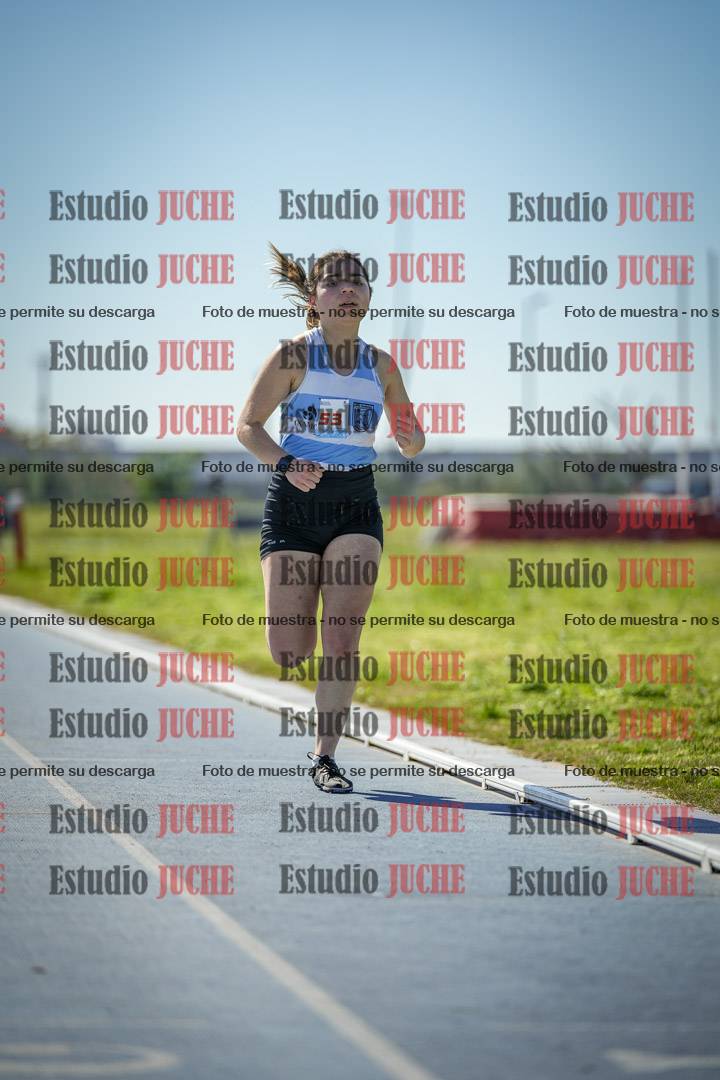 Fotos de los 5000 m llanos de mujeres y varones