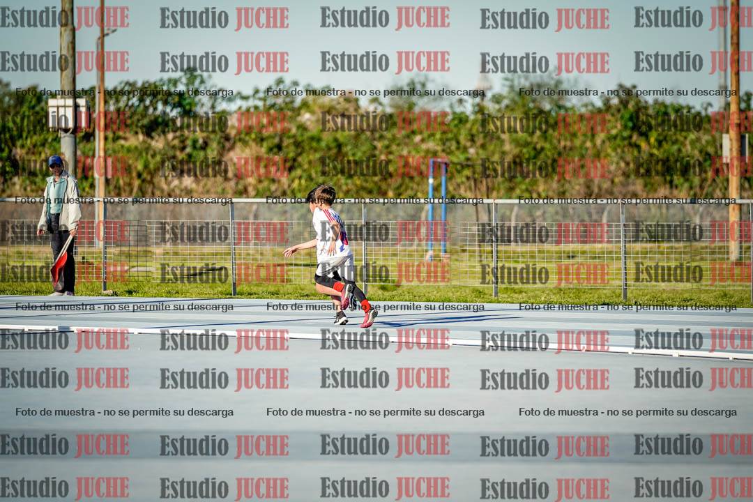 Fotos de las postas 5x80 m de varones