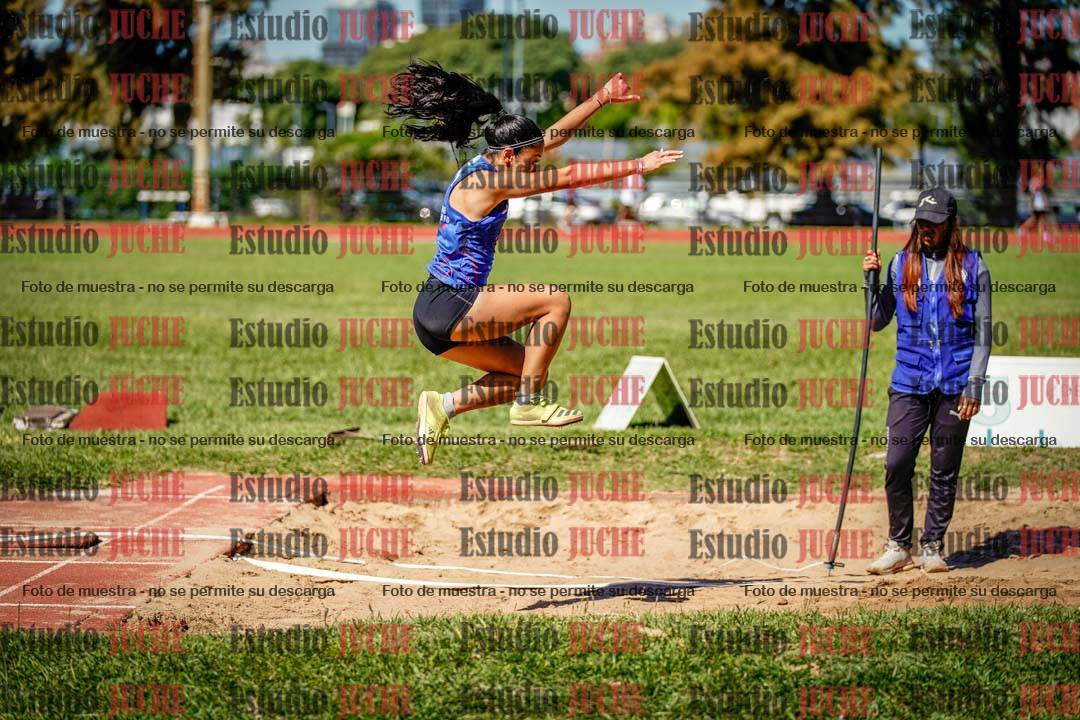 Fotos del salto en largo de mujeres
