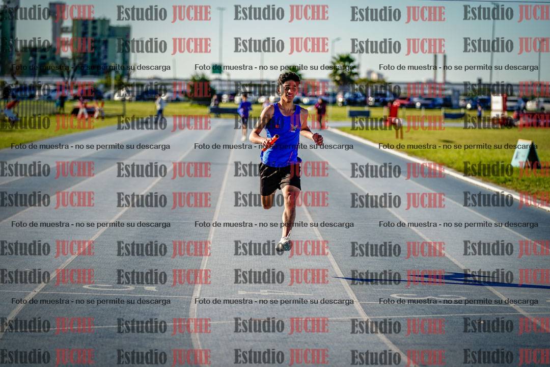 Fotos de las postas 5x80 m de varones