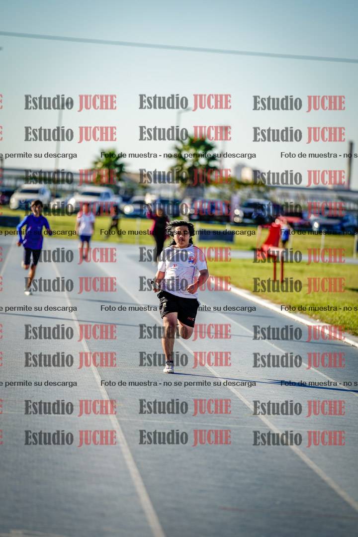 Fotos de las postas 5x80 m de varones