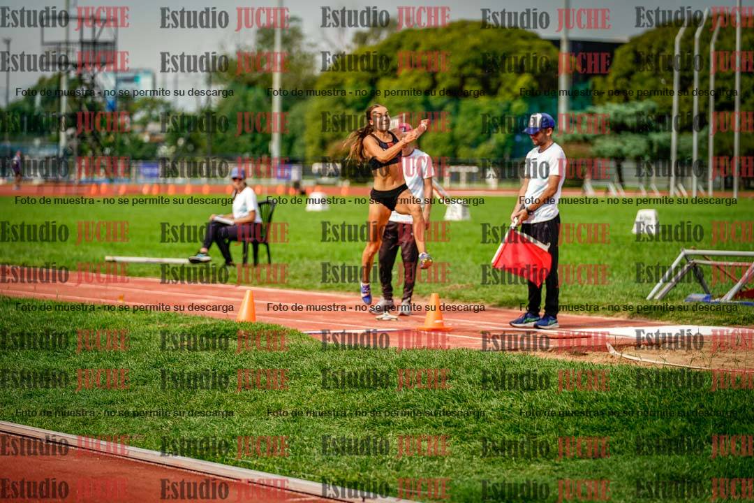 Fotos del salto en largo de mujeres