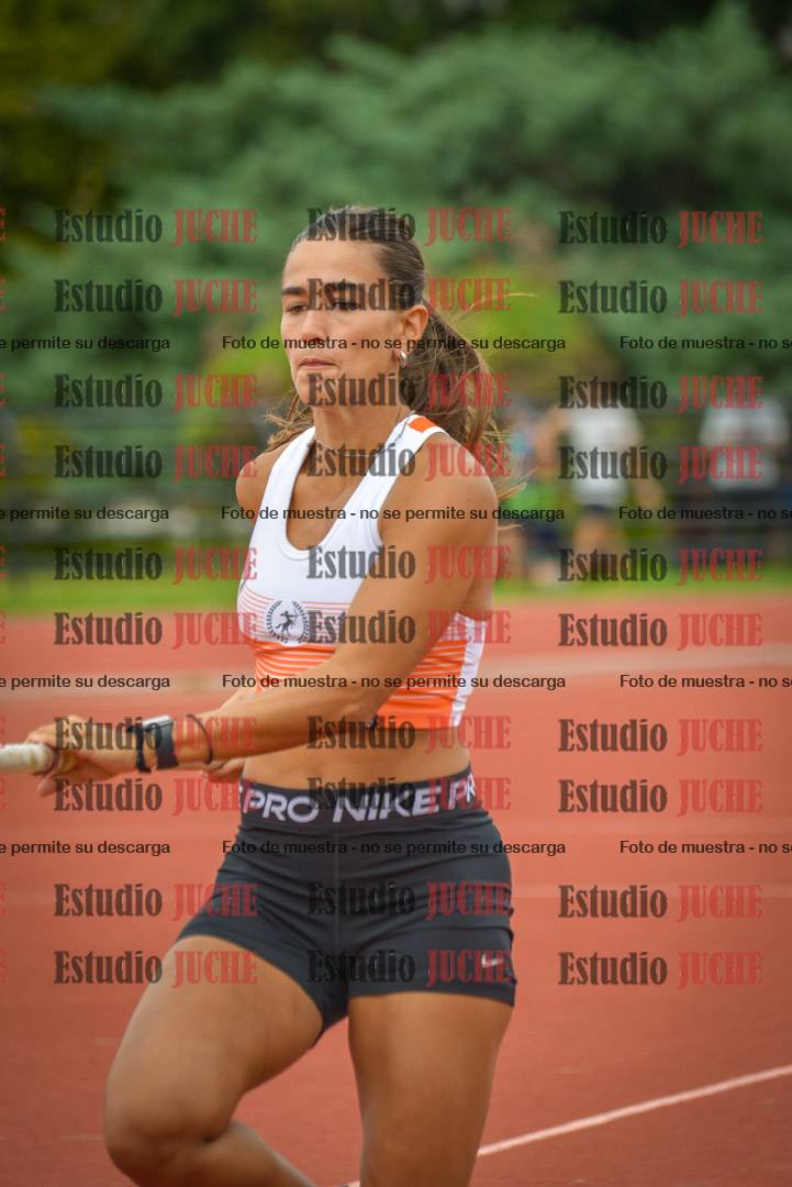 Fotos del salto con garrocha de mujeres y varones