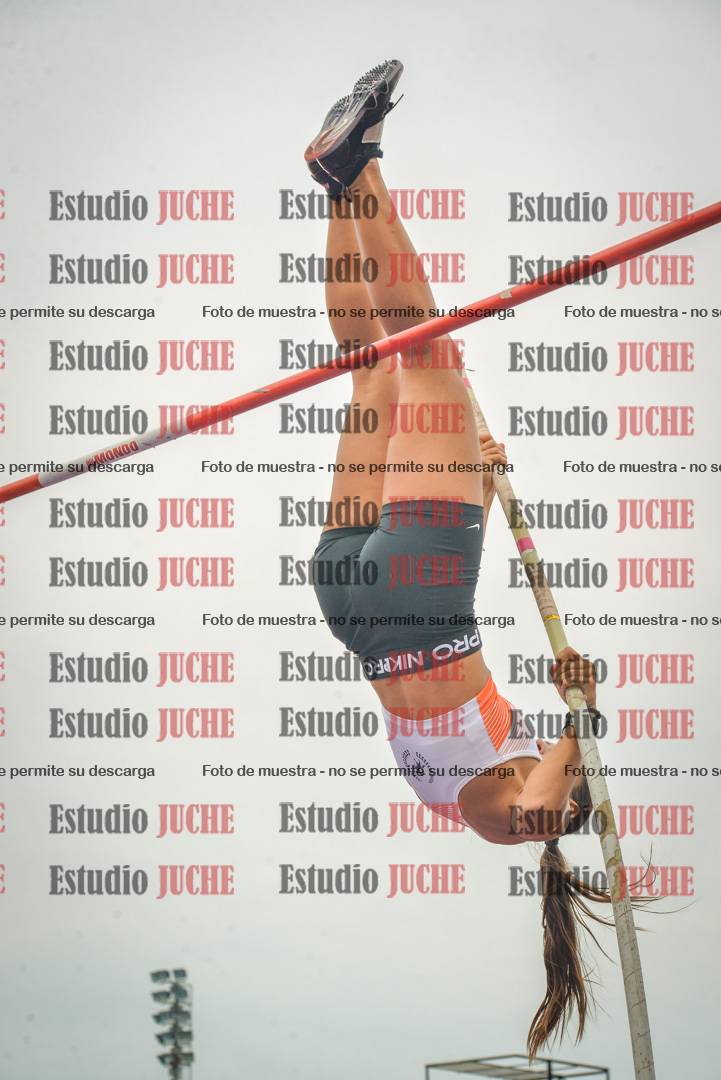 Fotos del salto con garrocha de mujeres y varones
