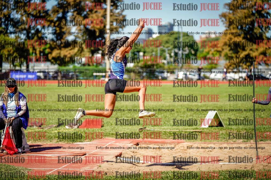 Fotos del salto en largo de mujeres