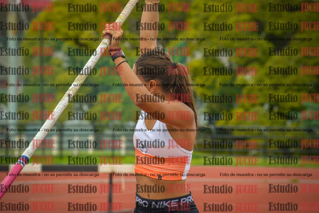 Fotos del salto con garrocha de mujeres y varones