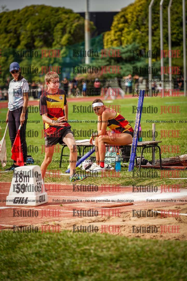 Fotos del salto triple de mujeres y varones