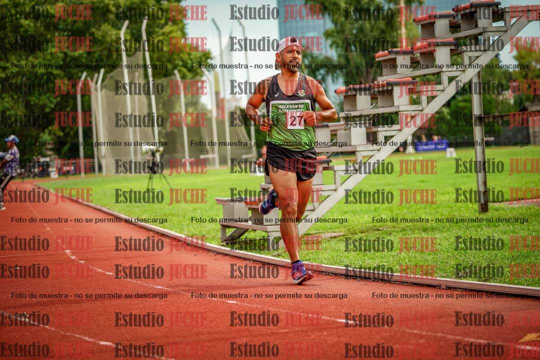 Fotos de los 3000 m con obstáculos de varones