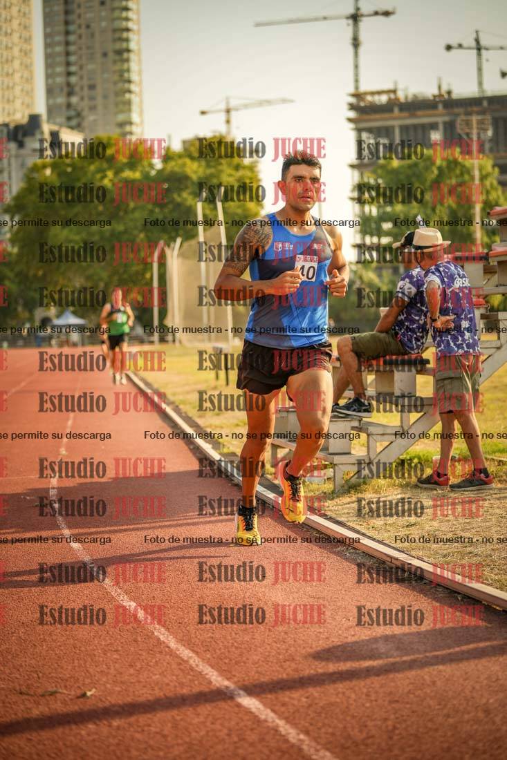 Fotos de los 5000 m llanos de mujeres y varones