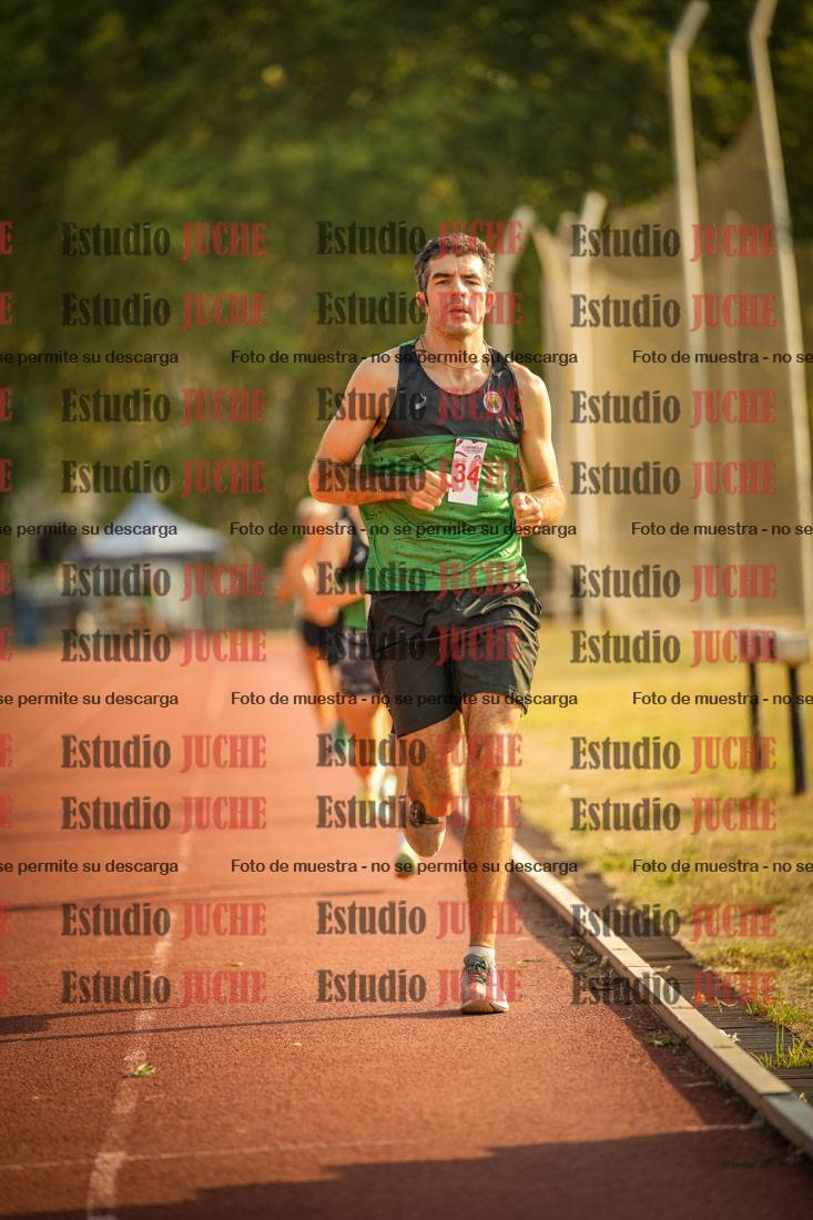 Fotos de los 5000 m llanos de mujeres y varones