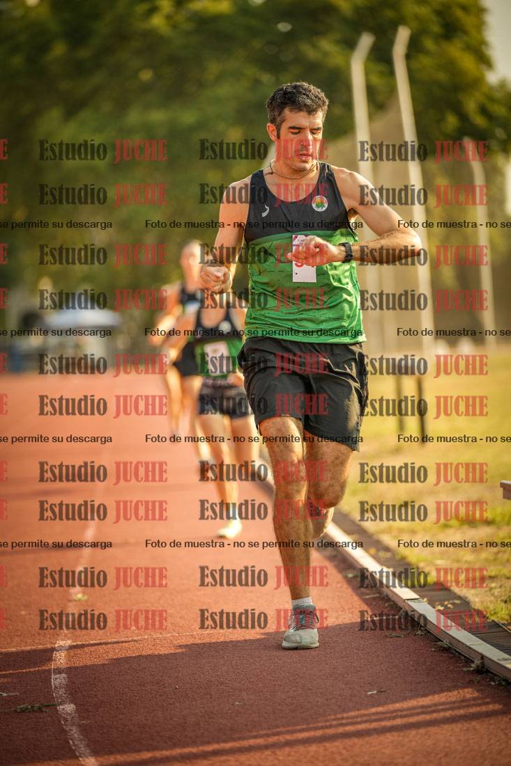 Fotos de los 5000 m llanos de mujeres y varones
