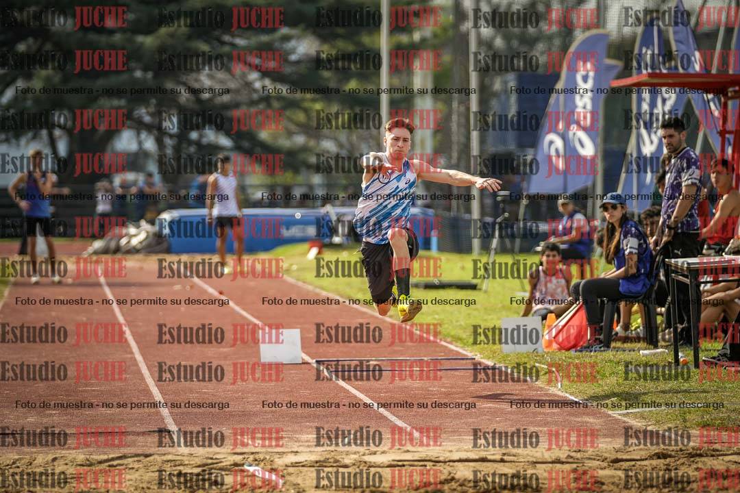 Fotos del salto en largo de varones