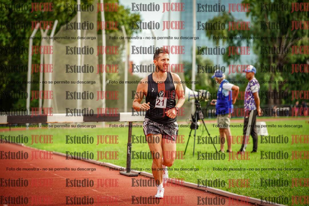 Fotos de los 3000 m con obstáculos de varones