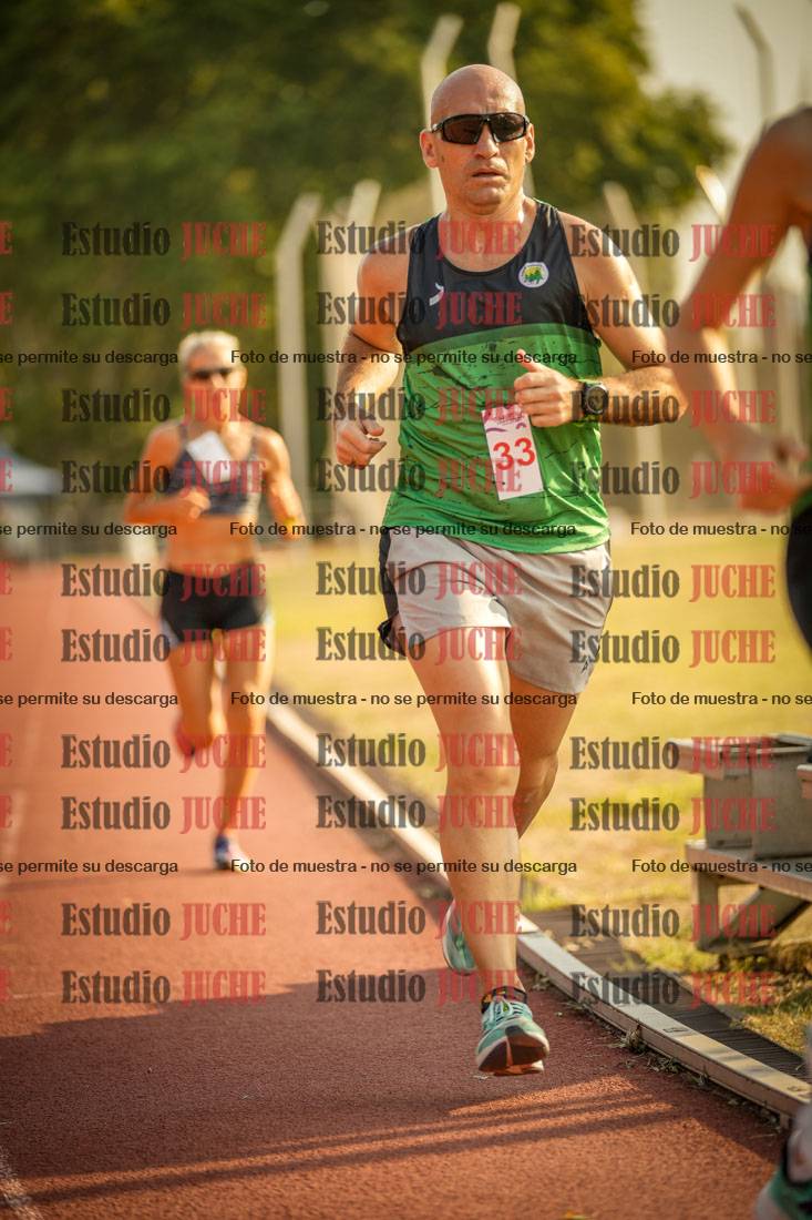 Fotos de los 5000 m llanos de mujeres y varones