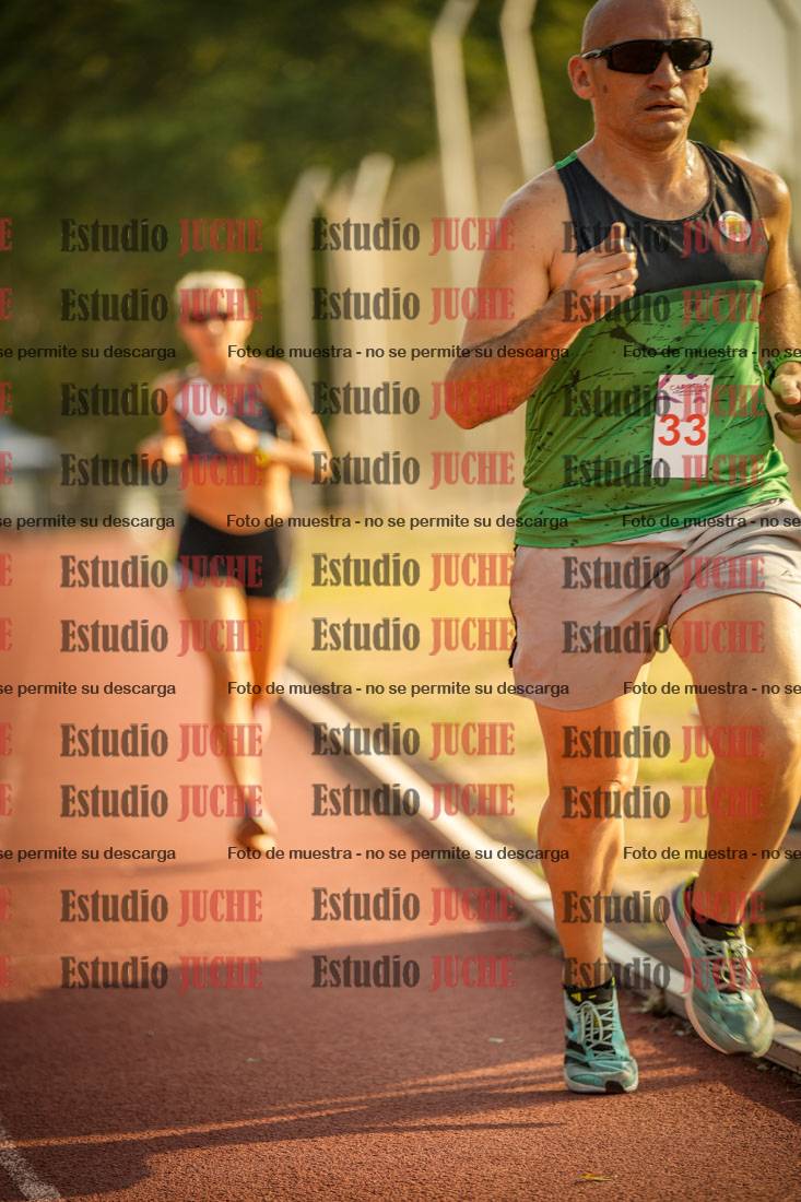 Fotos de los 5000 m llanos de mujeres y varones
